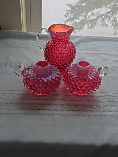 Fenton Syrup Pitcher & Candlestick Holders Cranberry Opalescent Hobnail 3pc. Lot