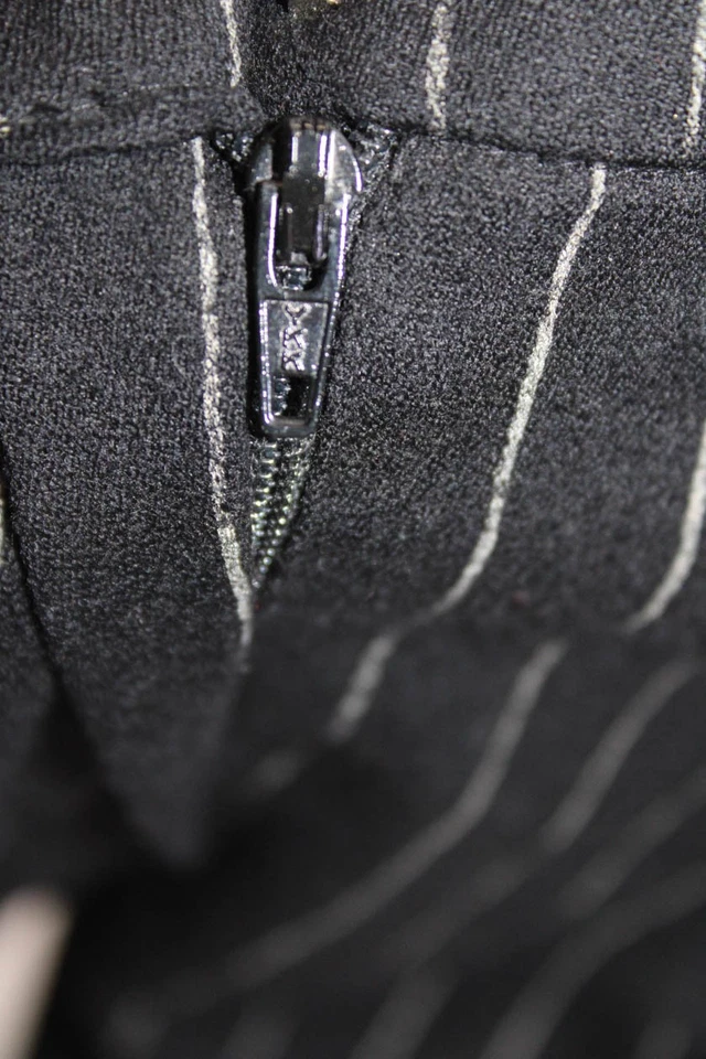 Pantalones cónicos Gunex para mujer a rayas frente plano tiro alto negros talla 6 Foto 4 de 4