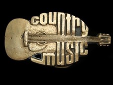 QI03170 VINTAGE 1980  COUNTRY MUSIC  COMMEMORATIVE SOLID BRASS BELT BUCKLE