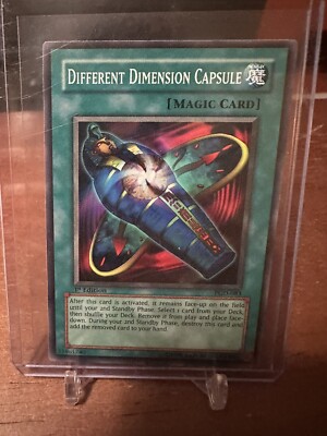 yugioh different dimension deck Amazon.com: YU-GI-OH! - Escape from The Dark Dimension (SDDC-EN040) -  Structure Deck: Dragons Collide - 1st Edition main image 1