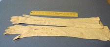 Two pairs of vintage women's formal gloves with buttons