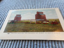 OLD POSTCARD TRACTOR HAULING 1000 BUSHELS OF WHEAT IN NORTH DAKOTA