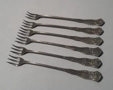 A lot of 6 1880 Pairpoint 6 1/4" Forks Cocktail Seafood Shrimp Oyster Shellfish.