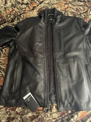 Never used, measurements are in the photos, it's Andrew Marc, New York