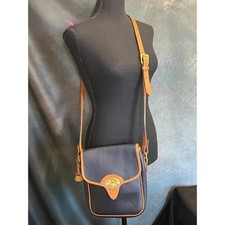 Dooney  Bourke Vintage Calvary Scout Navy Leather Saddle Bag Tan Trim