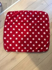 red baby blanket with white stars