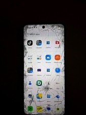 Phone With Tic Tok App Cracked Screen But Phone Works Well