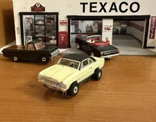 HTF Auto World H.O. Thunder Jet Ultra G ‘66 Chevy Nova SS in White w/Black Runs