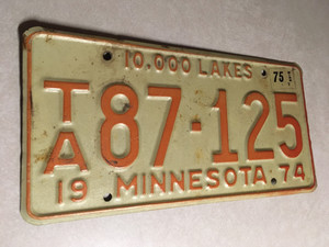Minnesota License Plate TA87-125 10,000 Lakes 1974 w/ 1975 Sticker Orange/Cream
