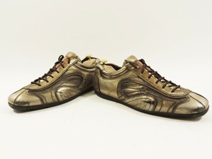 prada gold sneakers