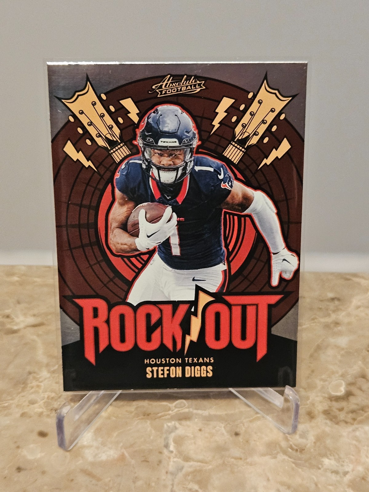 Stefon Diggs #RO-SDS Football Cards 2024 Panini Absolute Rock Out trading card — raw and PSA graded price guide