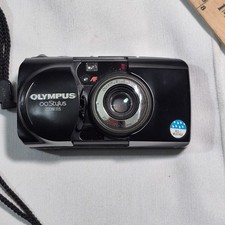 OLYMPUS STYLUS 115 CAMERA COVER IS NOT ACTIVATING POWER ON
