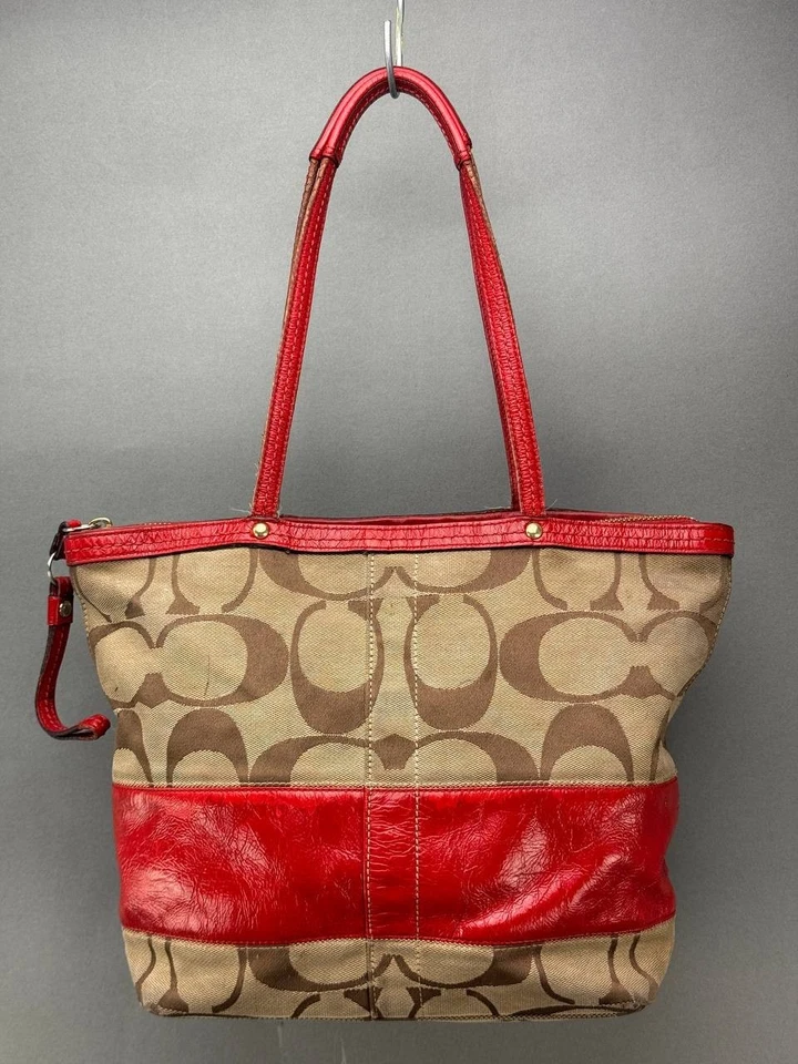 Bolso de Mano Coach Signature C Marrón con Rayas Rojas Foto 2 de 4