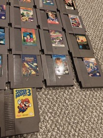 Huge NES 50 Game Lot Super Mario Tetris Metal Gear Excitebike Bionic Commando