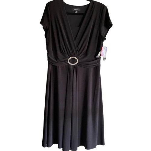 RM Richard’s black cocktail dress with rhinestone belt design.