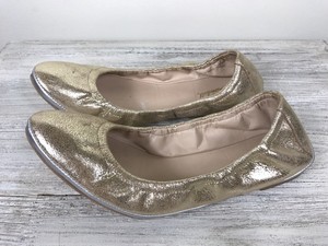 shiny gold flats