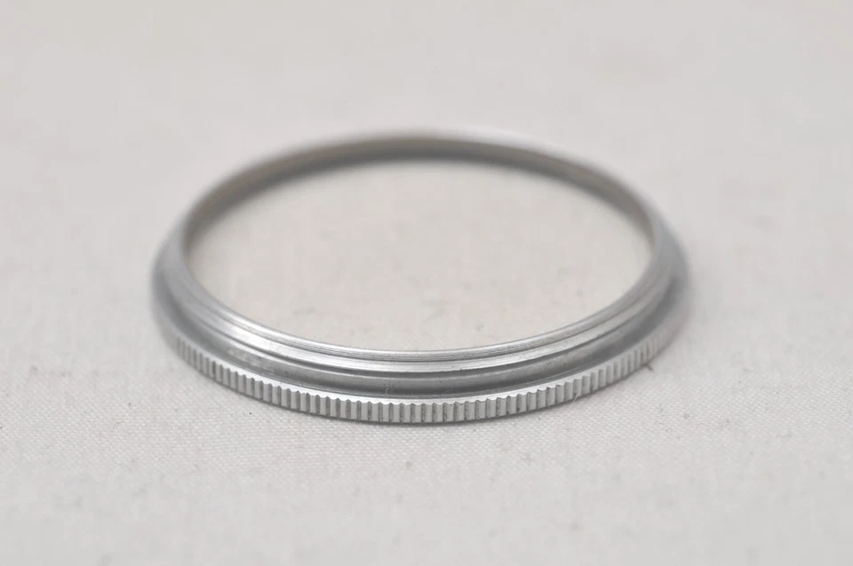 @ SakuraDo Camera @ Rare! @ Vintage Canon UV 1x 27mm Chrome Screw-In Lens Filter - Image 3 of 4