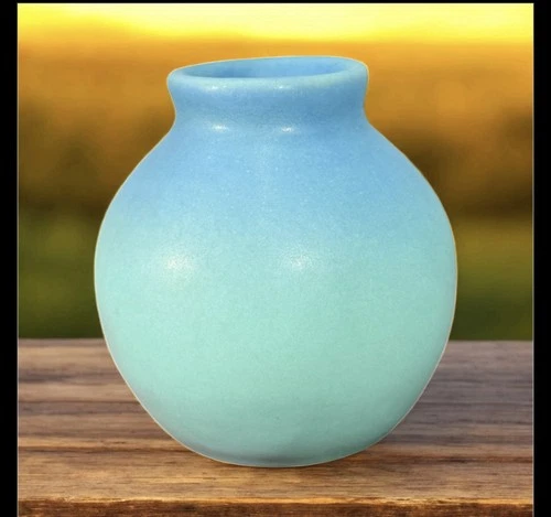 Ceramic vase with matte blue glaze by Van Briggle Pottery