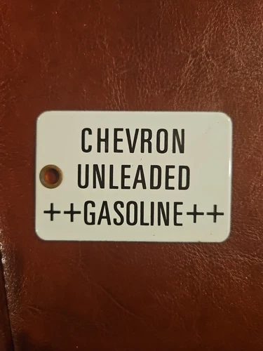 Vintage White Porcelain Chevron Unleaded Gasoline Tag