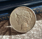 (#100753)  Peace Dollar:  1925 BU++ very clean fields. strong luster (see video) — photo 1