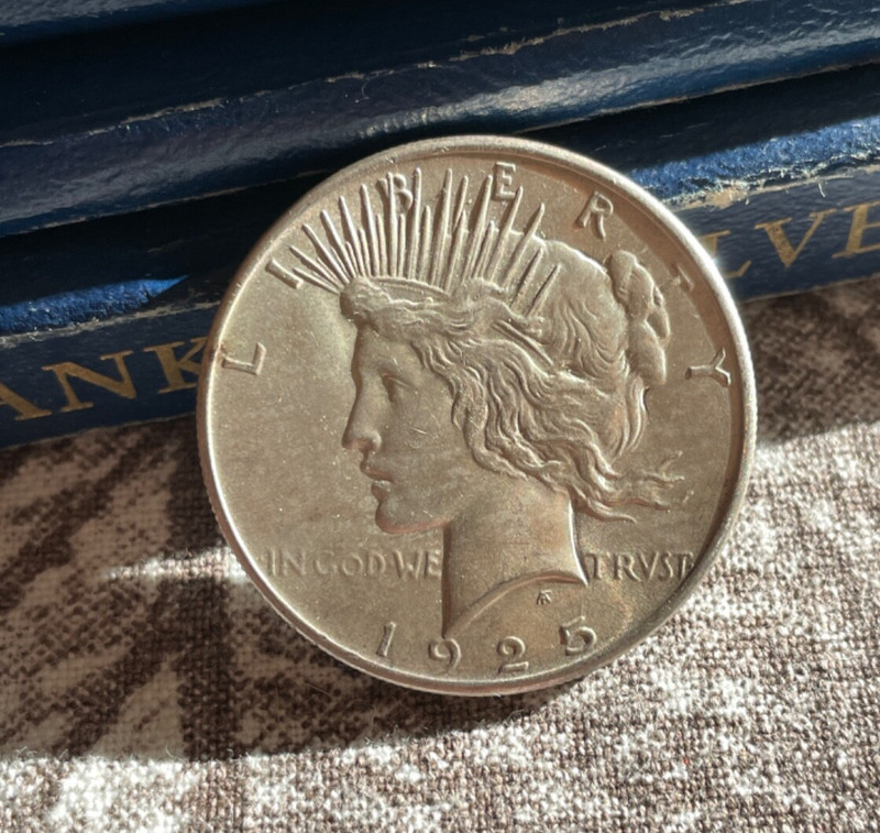 (#100753)  Peace Dollar:  1925 BU++ very clean fields. strong luster (see video)