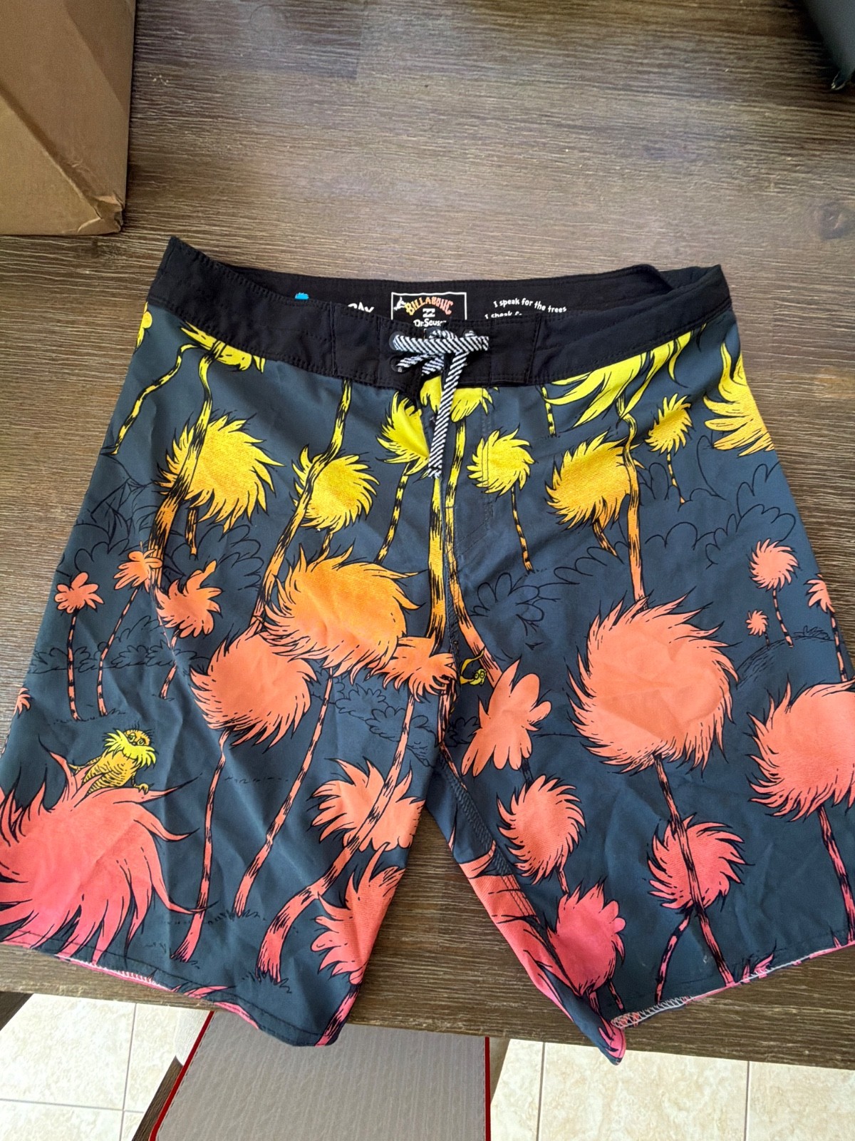 Billabong Dr Seuss Lorax board shorts, size 28, color blue. Excellent condition.