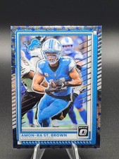 Amon-Ra St. Brown 2025 Optic Football Blue Stars Emoji Prizm Lions