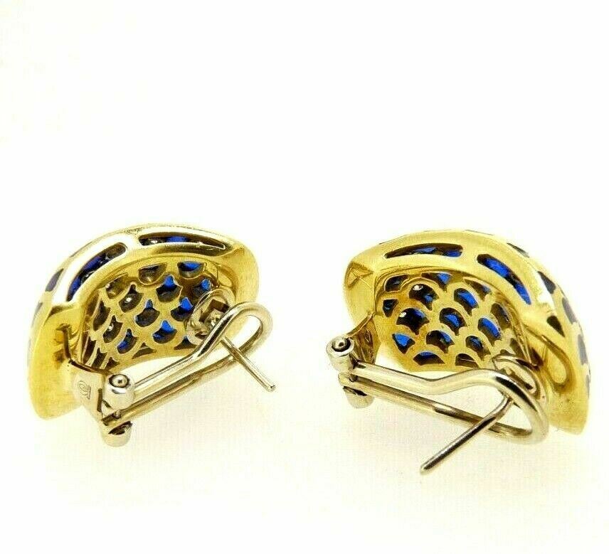 Lotto comprendente orecchini punto luce in oro giallo 18K con rubini e