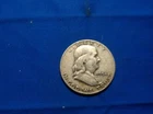 1954-D Franklin Half Dollar (tan/black)