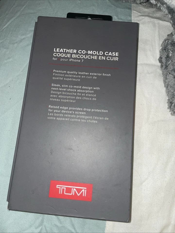 NUEVO EN CAJA TUMI Funda Co-Moldeada de Lona Recubierta para Apple iPhone 7 Plus Negra Precio de venta sugerido por el fabricante 49,99 USD Foto 2 de 3