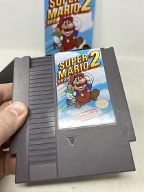 SUPER MARIO BROS. 2 MARIO MADNESS NINTENDO NES BOX AND GAME 