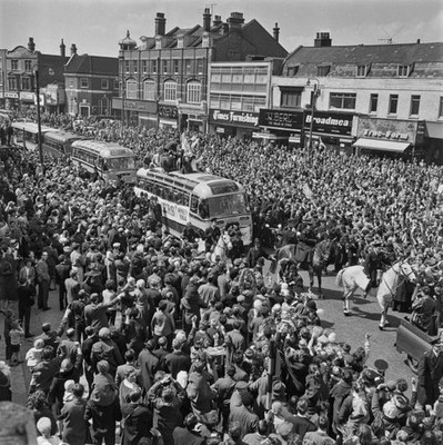 West Ham United supporters line streets of East London after their- Old Photo