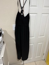 This is a strap dress from Wild Fable, characterized by its open back design