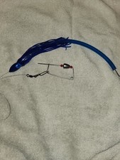 Striped Bass lure, 12" blue  tube with squid skirt, rudder, 3' leader.