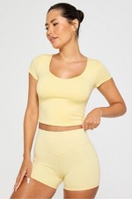 Fabletics AirLite Short Sleeve Top in Butter Yellow. Size XS