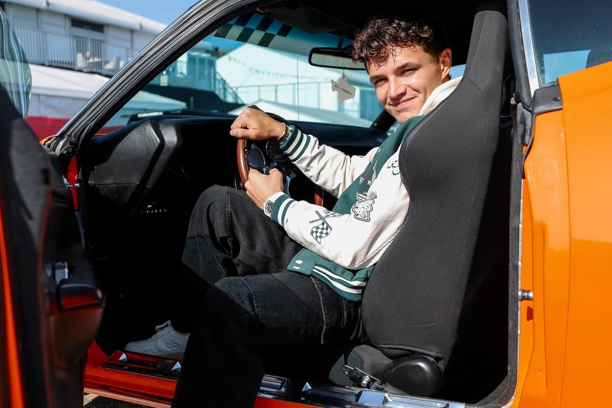 Lando Norris sitting in Plymouth Barracuda - eBay Motors