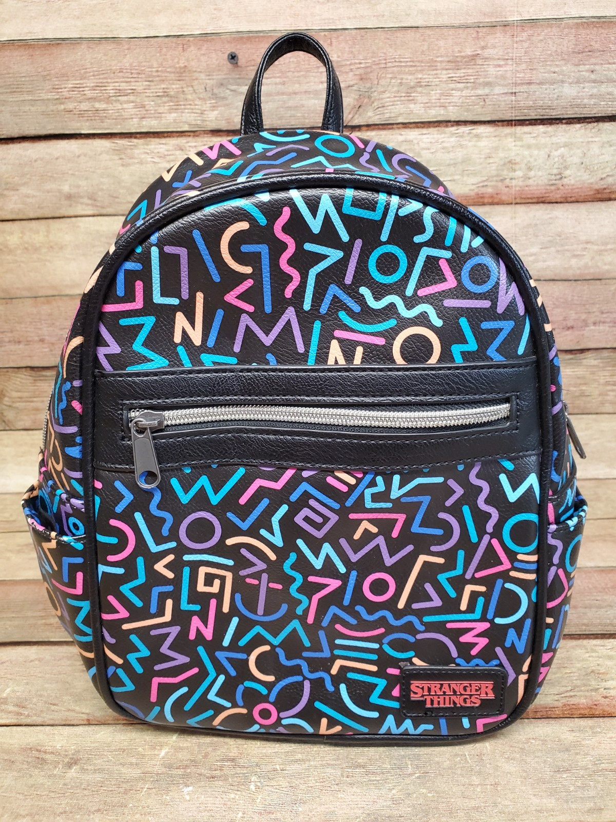 Stranger Things Black All Over Print 11in Backpack with Front Zip Pocket