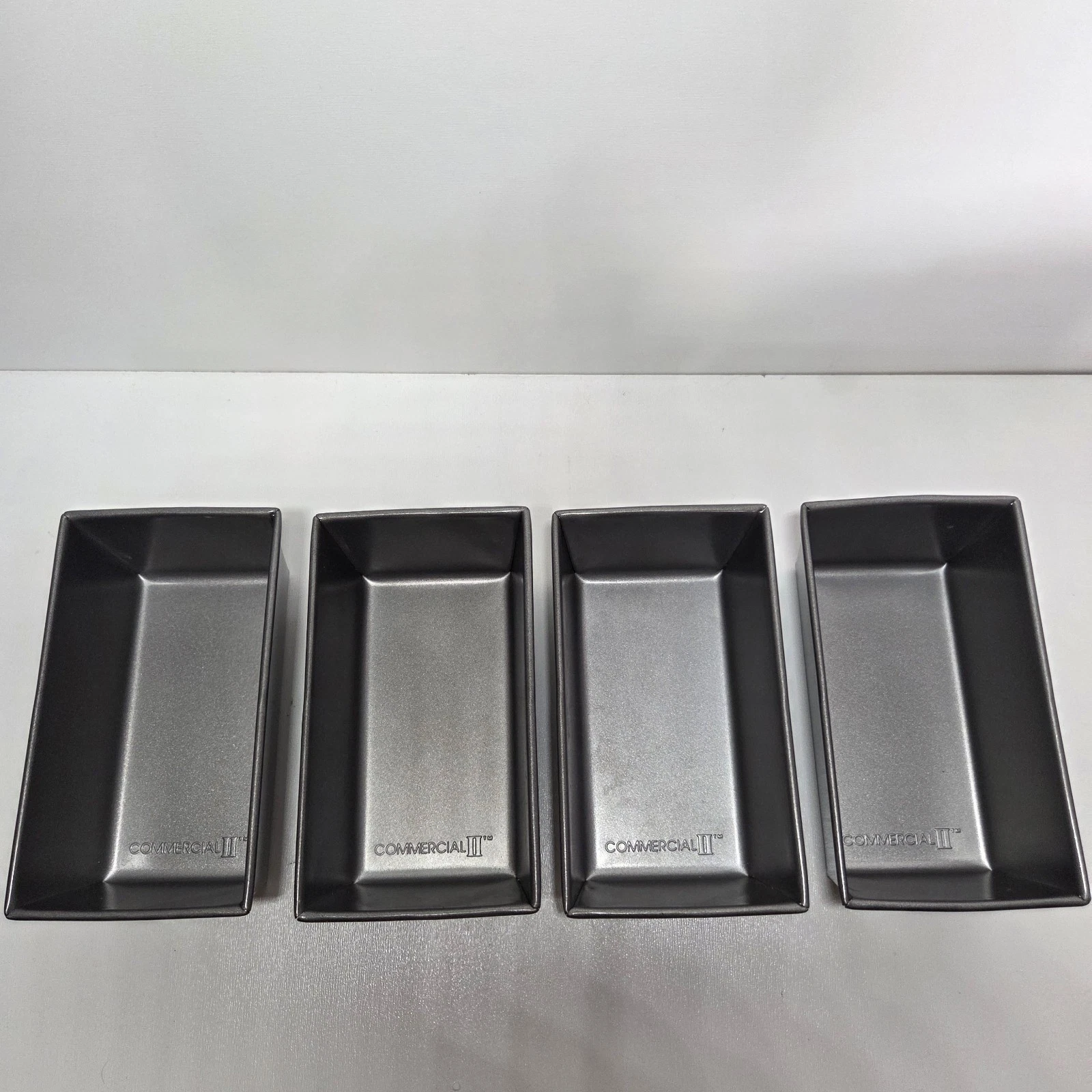 Commercial II Mini Non-stick Loaf Pans Set of 4. 6" x 3.5" x 4.3"