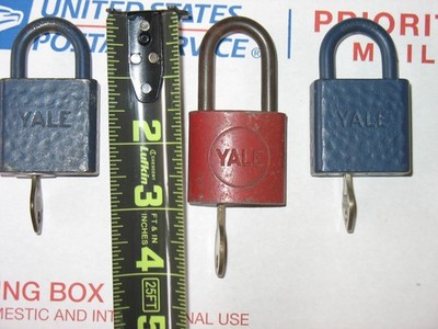 VINTAGE YALE RED , BLUE, AND SILVER PAD LOCKS LOT OF (4), USED, VALUE:$?????