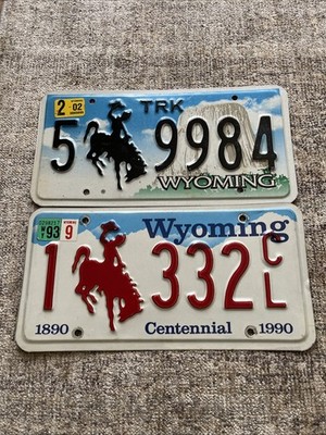 Wyoming Red & Black Cowboy License Plate Set 1993  Centennial  & 2002 Truck