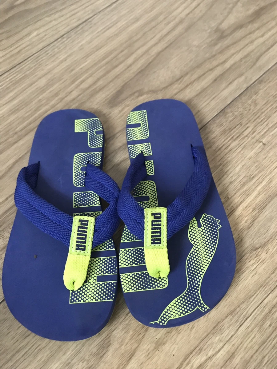 Puma blue flip flops 2025
