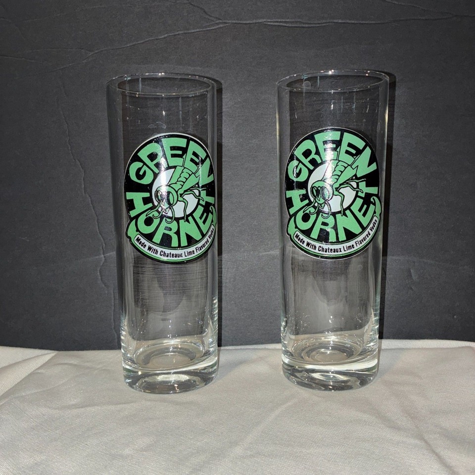 Rare mid-century branded barware tying together retro cocktail culture and a cult classic superhero — the Green Hornet branding makes these truly one-of-a-kind conversation starters.