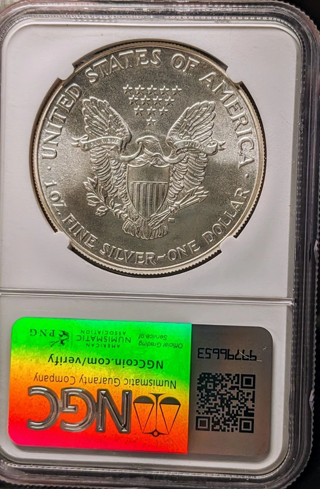 1986 American Silver Eagle $1 Early Production NGC MS 69 John Wayne Edition - Image 2 of 3