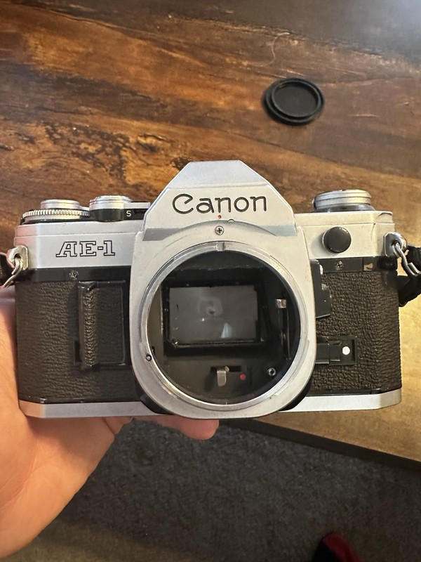 CANON AE-1 35mm Film SLR Camera with Bushnell 28mm f/2.8 Lens