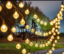 Solar-Powered Outdoor Lights, 50 LED Warm White  8 Lighting Modes