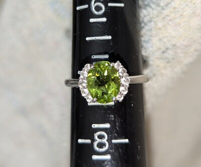 Peridot Ring + White Zircons, size 7, Silver/Rhodium, EUC, Tink Green!