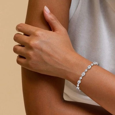 Armband 3,6 kt ovaler & rundgeschliffener Diamant Testpass 14 K Gold Lünette