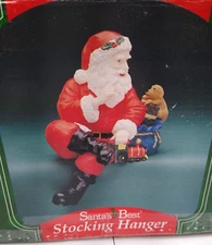 Santa's Best Stocking Hanger Santa Claus with Bag of Gifts