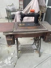 wheeler& wilson treadle sewing machine Local Pick Up Only Sold As Is
