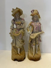  L & M INC. 8 1/2 '' TALL SET OF TWO BISQUE FIGURINES MAN AND WOMAN 